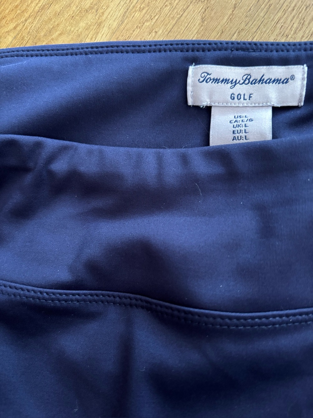 Tommy Bahama Navy Athletic Golf Skort Size L Navy with bottom flounce